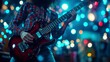 © Outkast - Close-up of a Guitarist's Hand Playing an Electric Guitar with a Blurred Background of Stage Lights