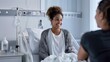 © Karina - Cheerful woman in hospital bed conversing with a friend during a visit in the afternoon
