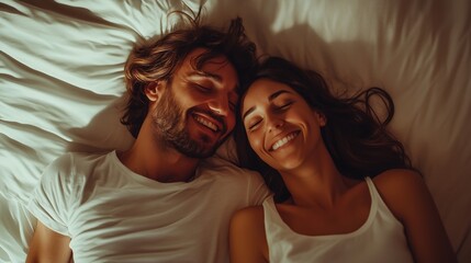 Wall Mural - A joyful couple sharing a cozy moment together in bed during a quiet morning, basking in warmth and connection