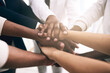 © JordaanExams/peopleimages.com - Team building, hands and business people in huddle for success, support or motivation for goal in office. Group, closeup or together in circle for community, connection or partnership for cooperation