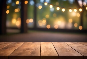 Wooden table in front of blurred nature background with bokeh lights