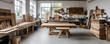 © watcharaphon - Spacious woodworking workshop with various tools, wooden materials, and workbenches. Suitable for craft, carpentry, and DIY projects.