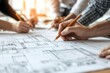 © ImagePulse - Close-up of hands writing notes on construction plans, surrounded by team members adjusting architectural sketches, photo-realistic detail
