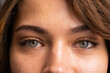 © Wavebreak Media - At office, Close-up of woman's eyes with green irises and natural makeup