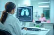 © lenblr - Doctor analyzing a mammogram on a computer screen, looking for signs of breast cancer
