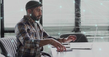 Canvas Print - Animation of connections over biracial man using smartphone