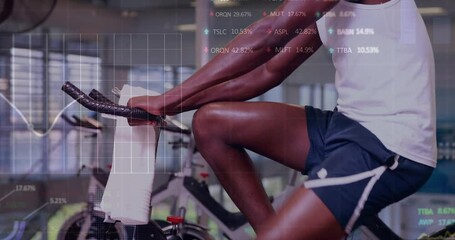 Canvas Print - Animation of financial data processing over african ameican man exercising in gym