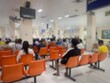 © Duangjit - Many patients come to see the doctor and wait for the hospital service .. lens blurred