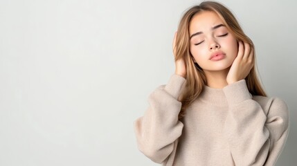 Portrait of Beautiful Young Woman with Closed Eyes