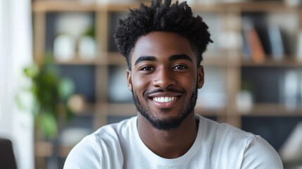 Wall Mural - Confident Young Black Man Smiling at Camera in Home Office Environment