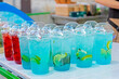 © Nataliia Makarovska - blue and red cooling fruity summer drinks outside. Outdoor cafe