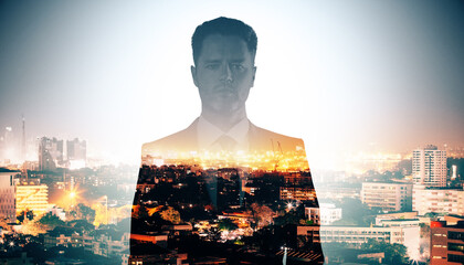 Canvas Print - Portrait of attractive young european business man on dawn city background with mock up place. Success and future concept. Double exposure.