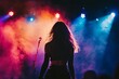 © Box Milk - Female singer performing on stage with a vibrant spotlight. The audience and stage lights are visible in the background