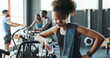 © HockleyM3/peopleimages.com - Fitness, smile and water with woman in gym for hydration on break from training or workout. Exercise, sports and thinking with happy athlete person in health club for challenge or performance