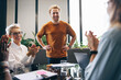 © Jacob Lund - Business people celebrating their success with a round of applause during a meeting