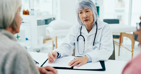 Poster - Woman, doctor and writing with elderly couple for consultation, checkup or prescription at hospital. Female person, surgeon or medical employee taking notes with senior clients at healthcare clinic