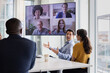 © ReeldealHD images - Businesspeople having a video conference in a meeting room