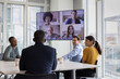 © ReeldealHD images - Businesspeople having a video conference in an office