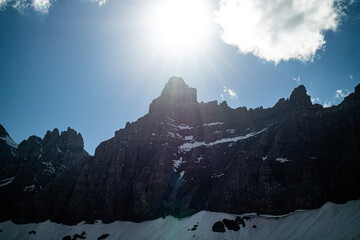 Iceberg lake at the Glacier national park, Montana, USA. Hiking trail is the most beautiful scenery of the u shape valley and covered with snow.