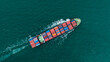 © SHUTTER DIN - logistic cargo container ship sailing in sea to import export goods and distributing products to dealer and consumers across worldwide, by container ship Transport business service.