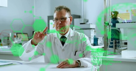 Wall Mural - animation of scientific data processing over caucasian male scientist in laboratory
