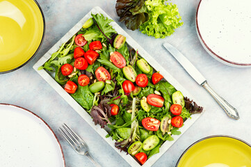 Canvas Print - Tomato and lettuce salad.