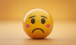 © Giorgi - sad yellow face, sad emoji like circle emotion background, background with sad yellow face, yellow background with sad emoji face