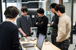 © Ed - A team of engineers discussing a solution to a technical problem in a project about machine learning systems, a group portrait reflects cooperation and innovation in a modern work environment.