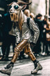 © EvgeniiaFreeman - Stylish Goat in Sunglasses Wearing Shiny Jacket and Golden Pants on City Street