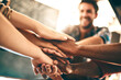 © peopleimages.com - Creative, team and hands stack in office for business, creativity and collaboration. Employees, synergy and gesture in workplace for community, support and huddle for cooperation with trust in agency