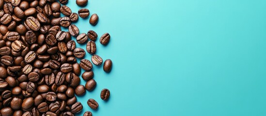 Leinwandbilder - Coffee beans on a blue background with copyspace in a coral trend