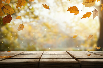 Wooden table with an autumn background and blurred golden-yellow bokeh light, with falling leaves in the air