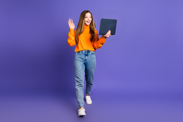 Sticker - Photo of youth student blonde hair cute happy smile girl in orange pullover talking to her parents using laptop isolated on violet color background