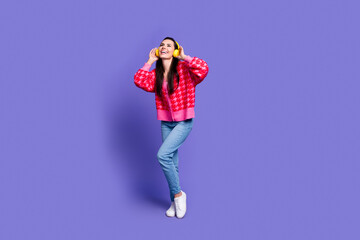 Canvas Print - Full length photo of shiny attractive lady dressed pink cardigan earphones enjoy music empty space isolated violet color background