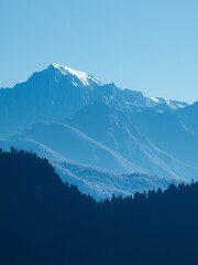 Poster - A snow-capped mountain peak rises above a forest.