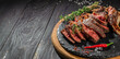 © Надія Коваль - sliced rib eye Tomahawk beef veal steak on a dark background. top view. copy space for text