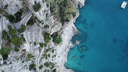 Sticker - Aerial view of coastal road and clear blue water in Capri.