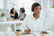 © peopleimages.com - Notes, businesswoman and microphone with computer for call center, telemarketing and customer information. Office, female agent and digital with headset for listening, helping and writing question