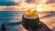 © rabbit75_fot - Tasty coconut drink with straw in hot tropical summer at sunset beach