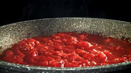 Sticker - Tomato sauce in a frying pan. Filmed on a high-speed camera at 1000 fps. High quality FullHD footage