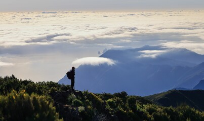 Poster - Hiker on mountain peak above the clouds. Madeira Island Portugal