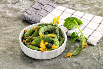 Raw gherkin cucumbers in the bowl