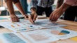 © pkproject - Business Team Discussing Strategy and Projections in Collaborative Planning Session