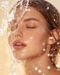 © Yelloone - Young woman splashing water on her glowing face, emphasizing fresh skin after brightening treatment, refreshing beauty, clean skincare concept