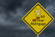 © Karen Roach - 40 year mortgage warning sign with stormy sky