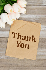 Wall Mural - Thank you note with light pink tulips bouquet on butcher paper on wood