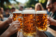 © Maria A - Group of people toasting with large beer mugs during an outdoor Oktoberfest celebration, golden beer reflecting sunlight, creating a festive and joyful atmosphere with a traditional Bavarian theme