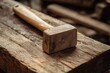 © StockUp - A wooden mallet placed on a sturdy workbench, symbolizing craftsmanship, hard work, and traditional woodworking.