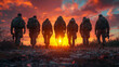 © Vertigo Images - Silhouettes of soldiers walking into the sunset.