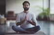 © alsu0112 - A young Indian man in a meditative pose on the right. A woman sits on a mat with her legs crossed and her hands folded in a prayer position and meditates. Advertising banner